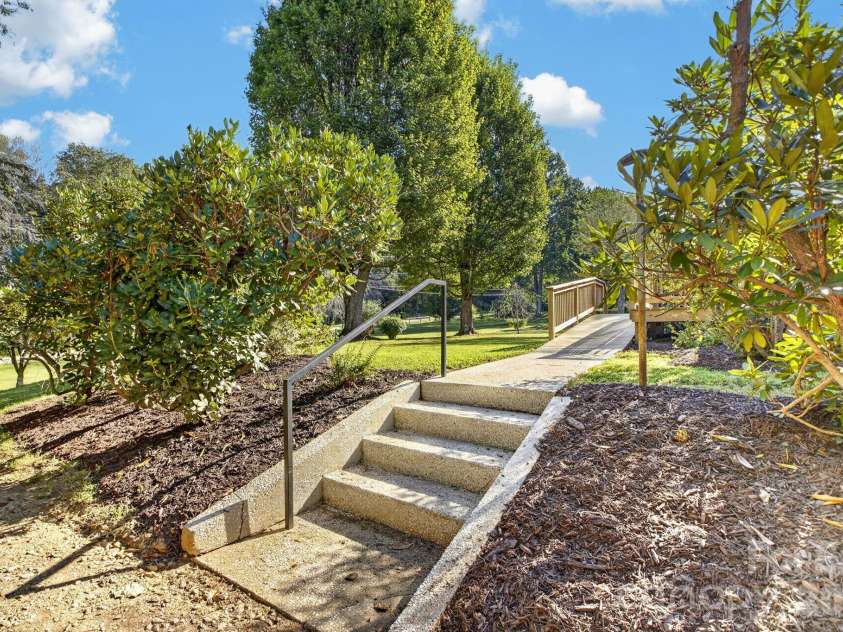 219 Old US 19 23 Highway, Candler, NC 28715.  MLS# CAR4421674, YatesRealty ID 49921. Side yard stairs