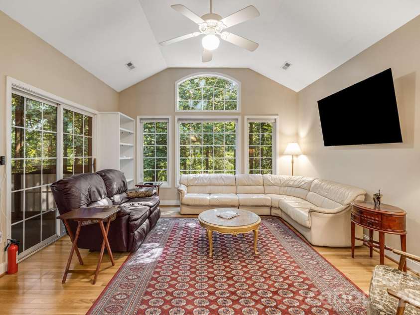 212 Carriage Springs Way, Hendersonville, NC 28791.  MLS# CAR4420645, YatesRealty ID 49923. Great-room with vaulted ceilings.