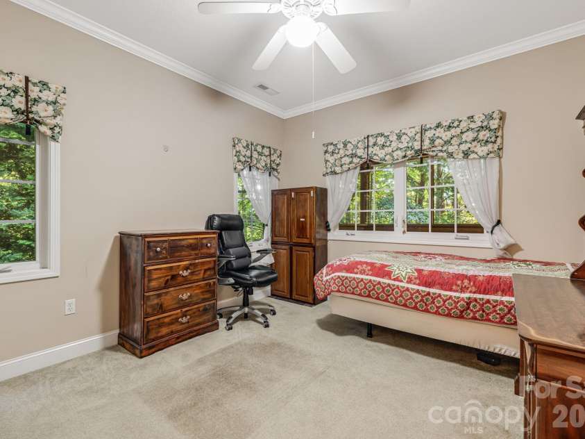 212 Carriage Springs Way, Hendersonville, NC 28791.  MLS# CAR4420645, YatesRealty ID 49923. Main level guest room.