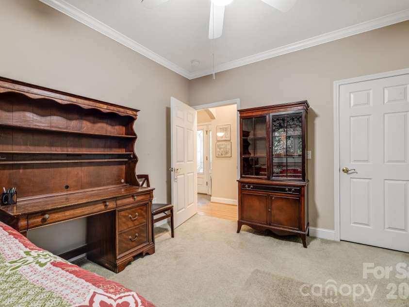 212 Carriage Springs Way, Hendersonville, NC 28791.  MLS# CAR4420645, YatesRealty ID 49923. Main level guest room