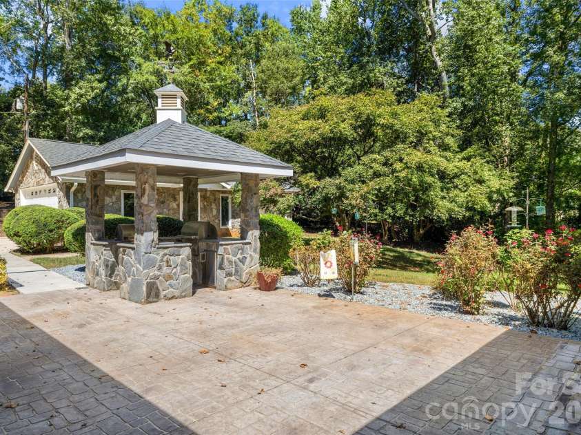 600 Fairway Drive, Fort Mill, SC 29715.  MLS# CAR4407842, YatesRealty ID 49927. Outdoor kitchen and patio