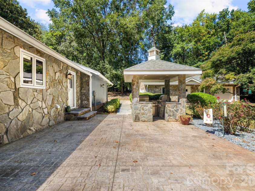 600 Fairway Drive, Fort Mill, SC 29715.  MLS# CAR4407842, YatesRealty ID 49927. Patio and outdoor kitchen