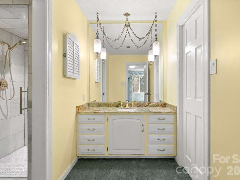 600 Fairway Drive, Fort Mill, SC 29715.  MLS# CAR4407842, YatesRealty ID 49927. Primary bathroom