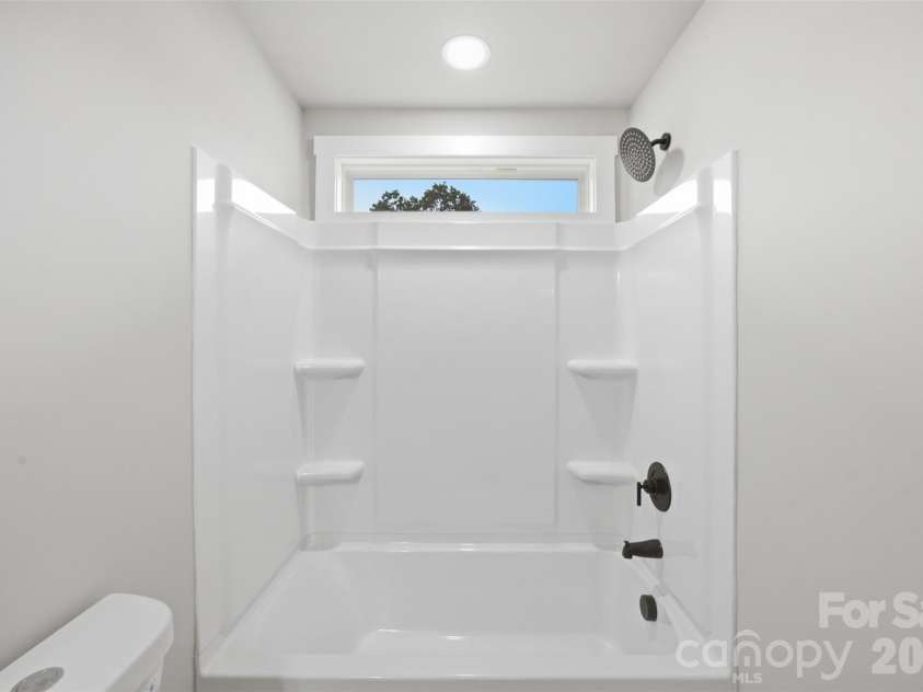 511 Ligon Street, Shelby, NC 28150.  MLS# CAR4410205, YatesRealty ID 49948. Guest bath, tub shower combo