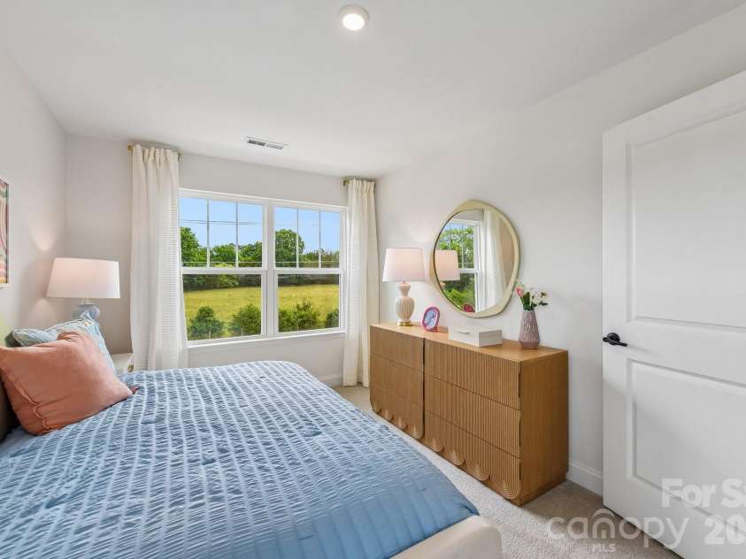 9024 Gulledge Court, Charlotte, NC 28262.  MLS# CAR4423404, YatesRealty ID 49951. Representative Photo From Model