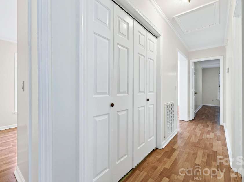 47 Wilmington Street, Asheville, NC 28806.  MLS# CAR4421407, YatesRealty ID 49969. Hallway laundry closet