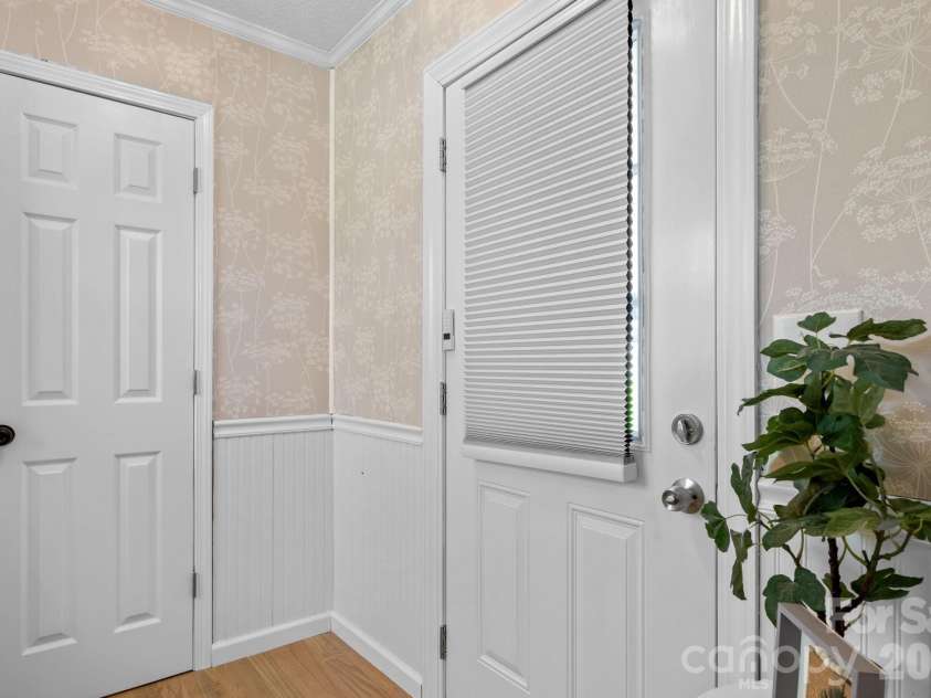307 Park Drive, Stanley, NC 28164.  MLS# CAR4359608, YatesRealty ID 4997. Entry from Carport