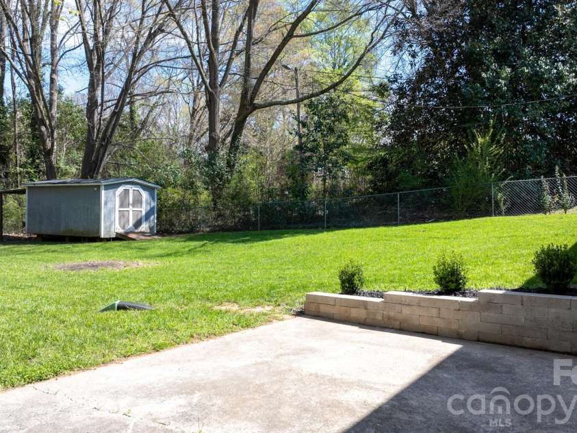 307 Park Drive, Stanley, NC 28164.  MLS# CAR4359608, YatesRealty ID 4997. Huge, fenced Backyard!