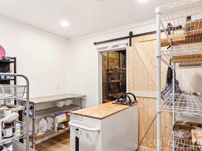 333 Kenilworth Road, Asheville, NC 28805.  MLS# CAR4422949, YatesRealty ID 49975. Workshop in basement, currently being used for making soap.