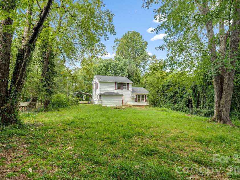 35 Blade Road, Hendersonville, NC 28791.  MLS# CAR4423417, YatesRealty ID 49984. Back yard