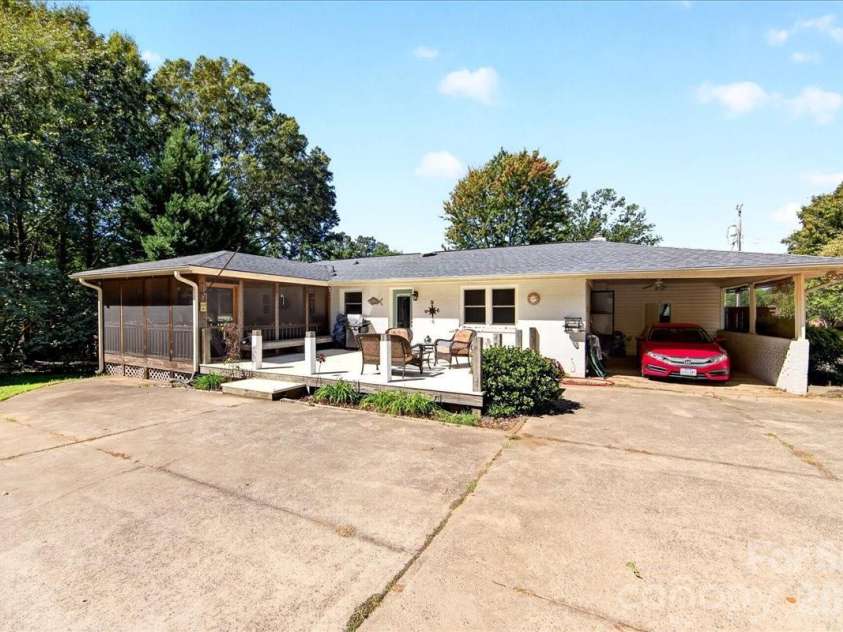 1442 Plumcrest Drive, Charlotte, NC 28216.  MLS# CAR4422358, YatesRealty ID 49987. Back exterior