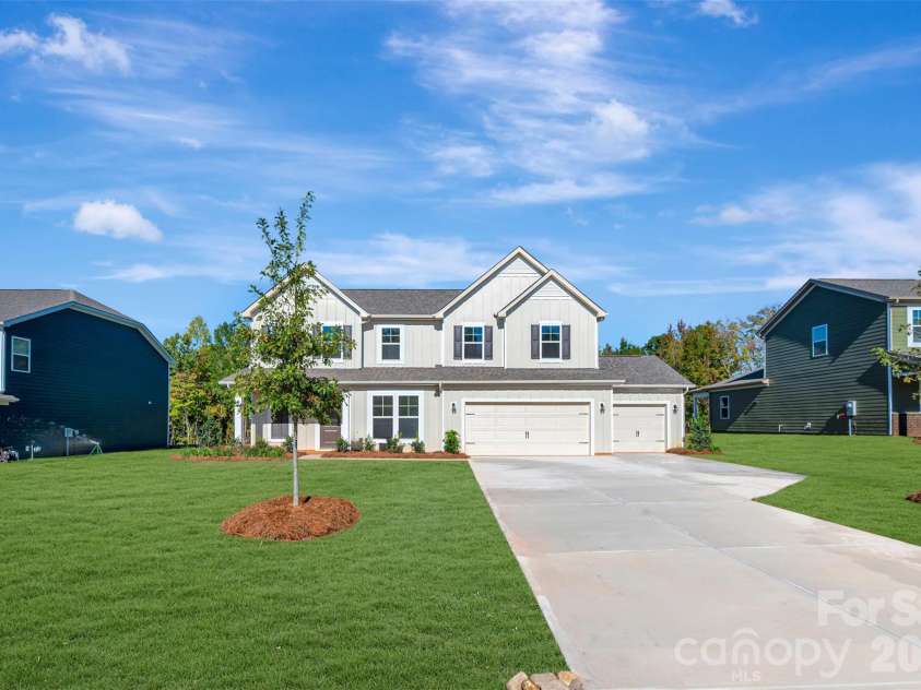 230 Amber Glen Drive, Locust, NC 28097.  MLS# CAR4423302, YatesRealty ID 49988. Exterior