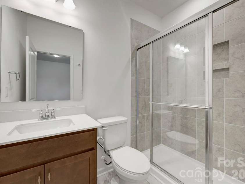 230 Amber Glen Drive, Locust, NC 28097.  MLS# CAR4423302, YatesRealty ID 49988. First floor bathroom