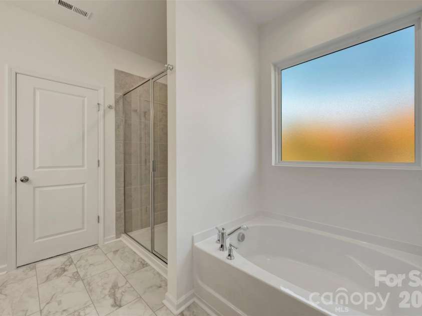 230 Amber Glen Drive, Locust, NC 28097.  MLS# CAR4423302, YatesRealty ID 49988. Owner's suite