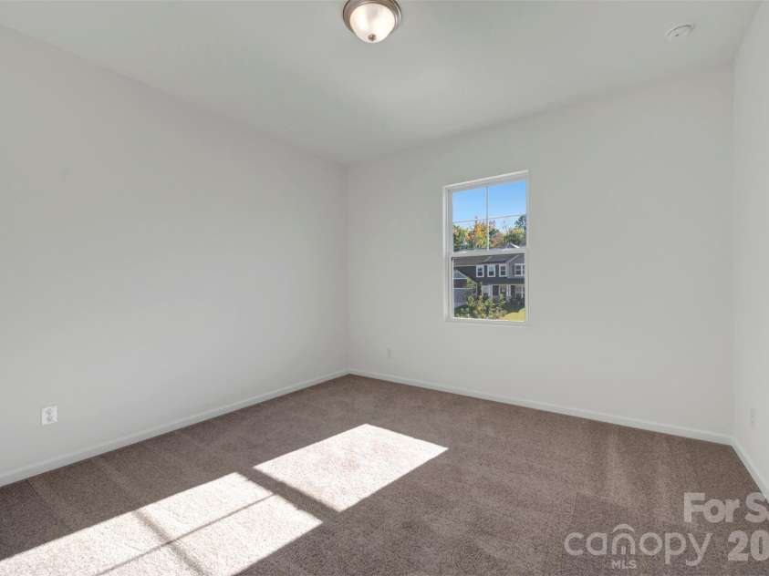 230 Amber Glen Drive, Locust, NC 28097.  MLS# CAR4423302, YatesRealty ID 49988. Secondary bedroom