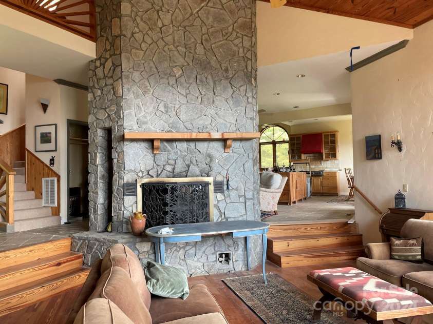 220 Hog Pen Road, Newland, NC 28657.  MLS# CAR4064509, YatesRealty ID 50. Two way fireplace