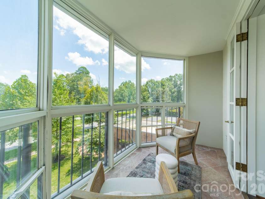 1530 Queens Road, Charlotte, NC 28207.  MLS# CAR4413121, YatesRealty ID 50008. Glassed in Sunroom