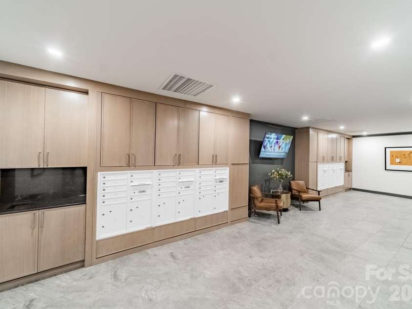 1530 Queens Road, Charlotte, NC 28207.  MLS# CAR4413121, YatesRealty ID 50008. Mail Room - Basement Entrance