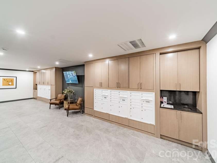1530 Queens Road, Charlotte, NC 28207.  MLS# CAR4413121, YatesRealty ID 50008. Mail Room - Basement Entrance