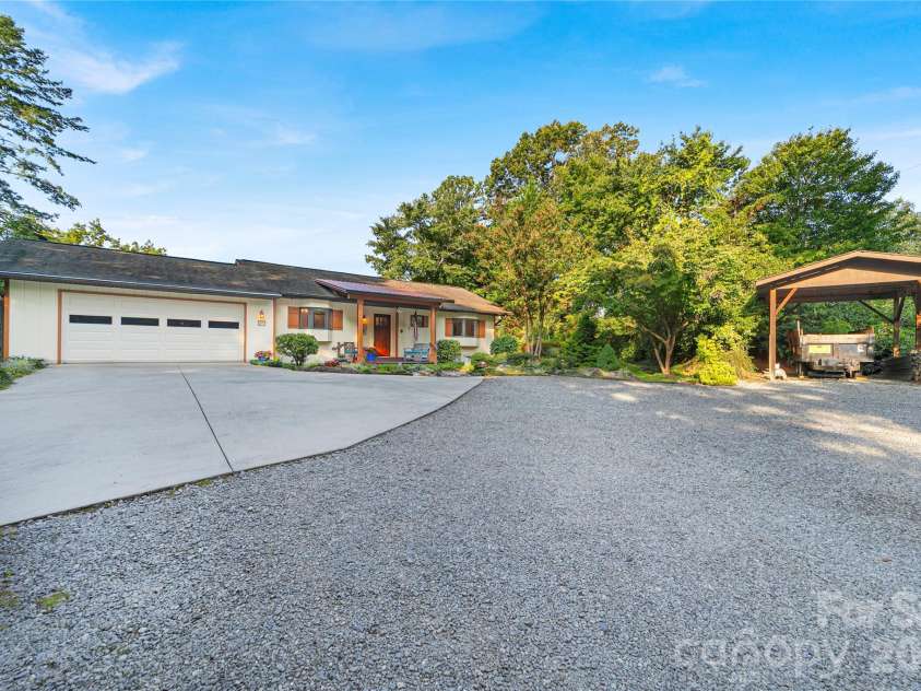 374 Riverside Estate Road, Brevard, NC 28712.  MLS# CAR4418900, YatesRealty ID 50031. 