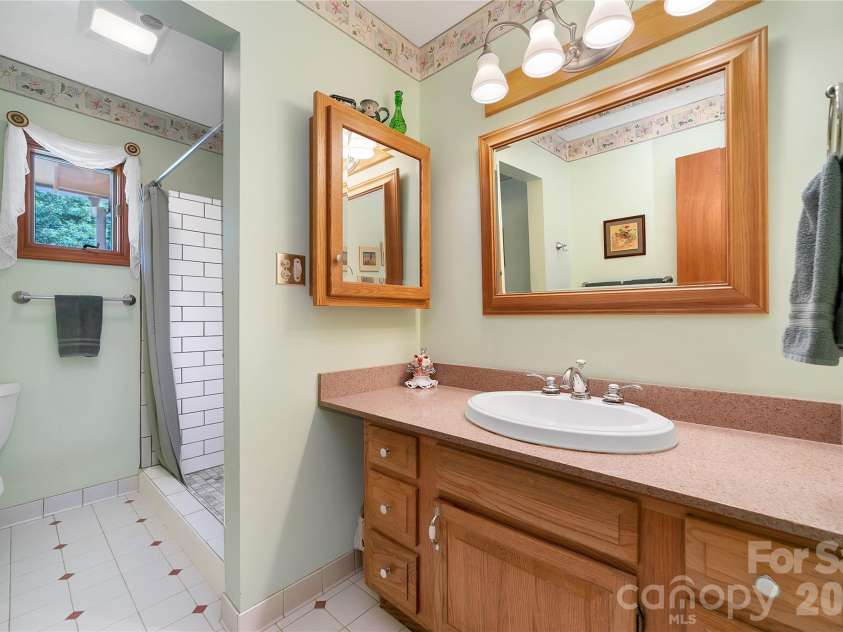 374 Riverside Estate Road, Brevard, NC 28712.  MLS# CAR4418900, YatesRealty ID 50031. 