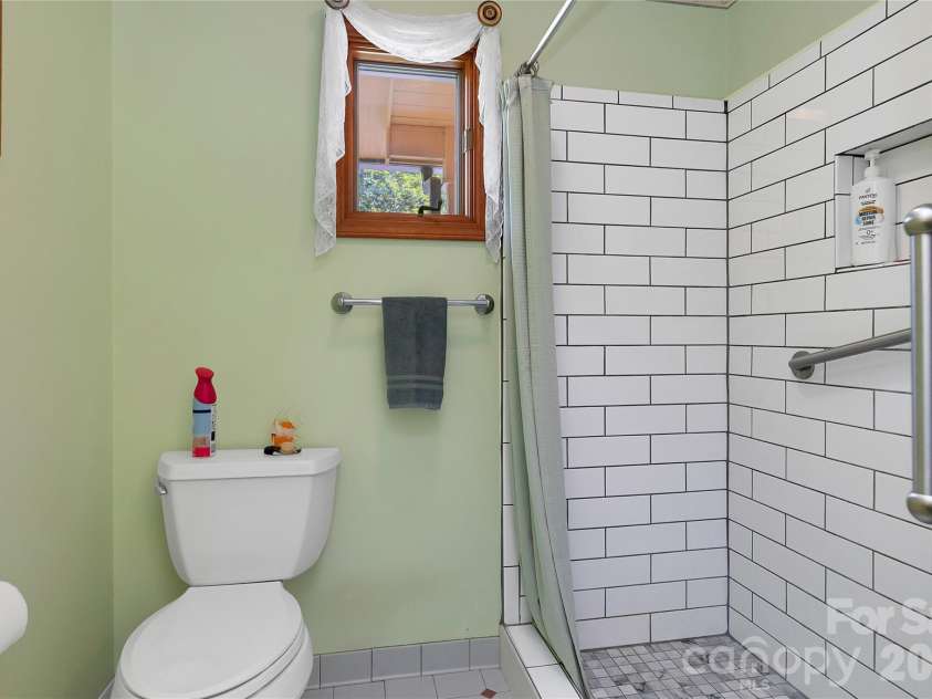 374 Riverside Estate Road, Brevard, NC 28712.  MLS# CAR4418900, YatesRealty ID 50031. 