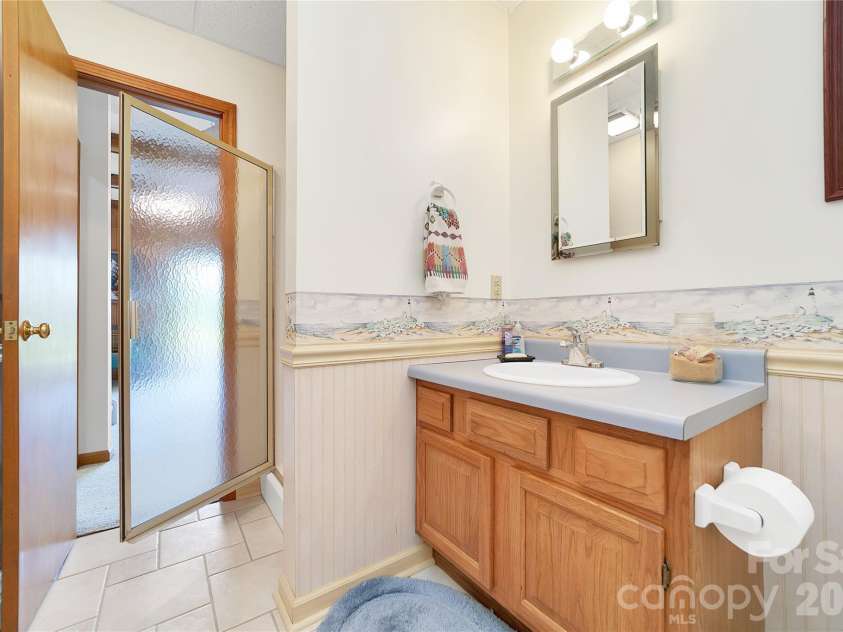 374 Riverside Estate Road, Brevard, NC 28712.  MLS# CAR4418900, YatesRealty ID 50031. 