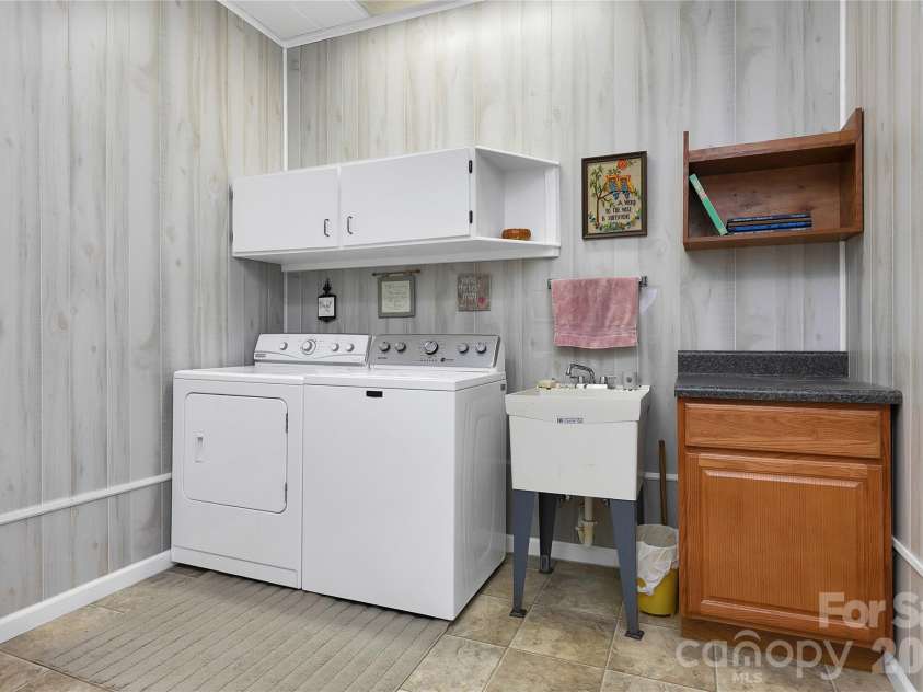 374 Riverside Estate Road, Brevard, NC 28712.  MLS# CAR4418900, YatesRealty ID 50031. 