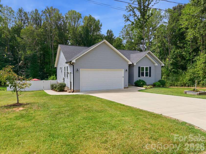 218 Cleo Avenue, Granite Quarry, NC 28146.  MLS# CAR4423536, YatesRealty ID 50042. 