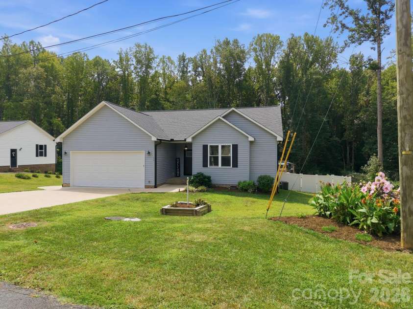 218 Cleo Avenue, Granite Quarry, NC 28146.  MLS# CAR4423536, YatesRealty ID 50042. 