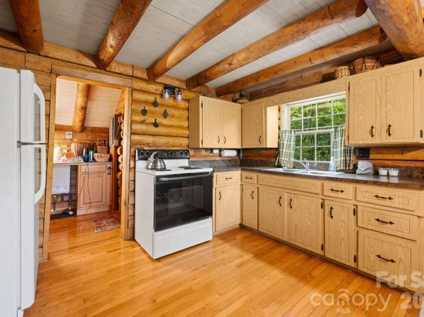 299 Sugar Vista Lane, Newland, NC 28657.  MLS# CAR4422071, YatesRealty ID 50049. 