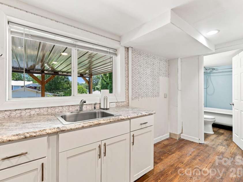 14 Indiana Avenue, Asheville, NC 28806.  MLS# CAR4401394, YatesRealty ID 50059. Basement kitchen