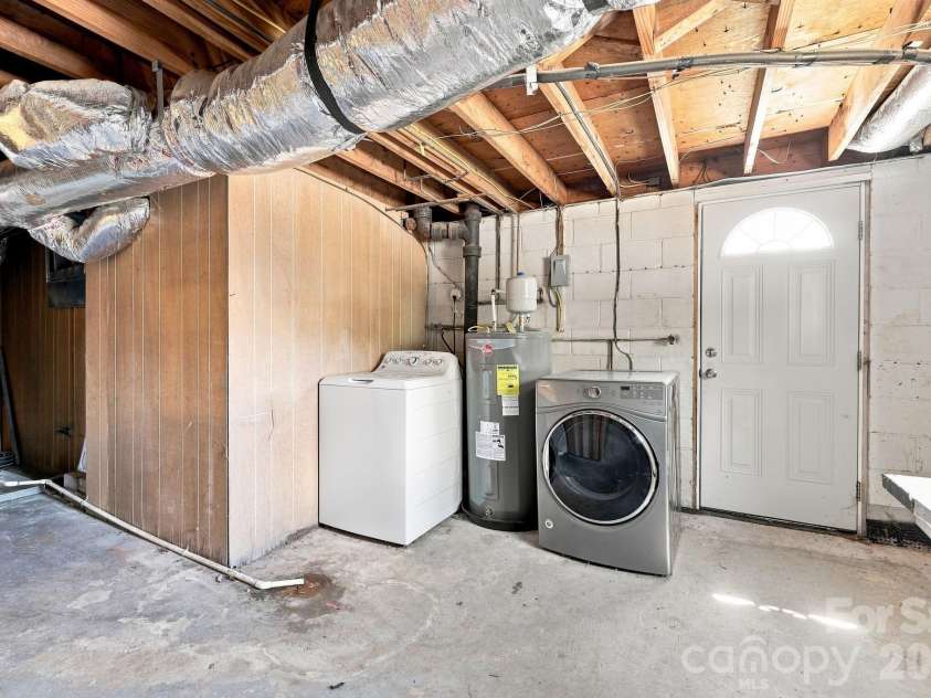 14 Indiana Avenue, Asheville, NC 28806.  MLS# CAR4401394, YatesRealty ID 50059. Basement utility room, shared space