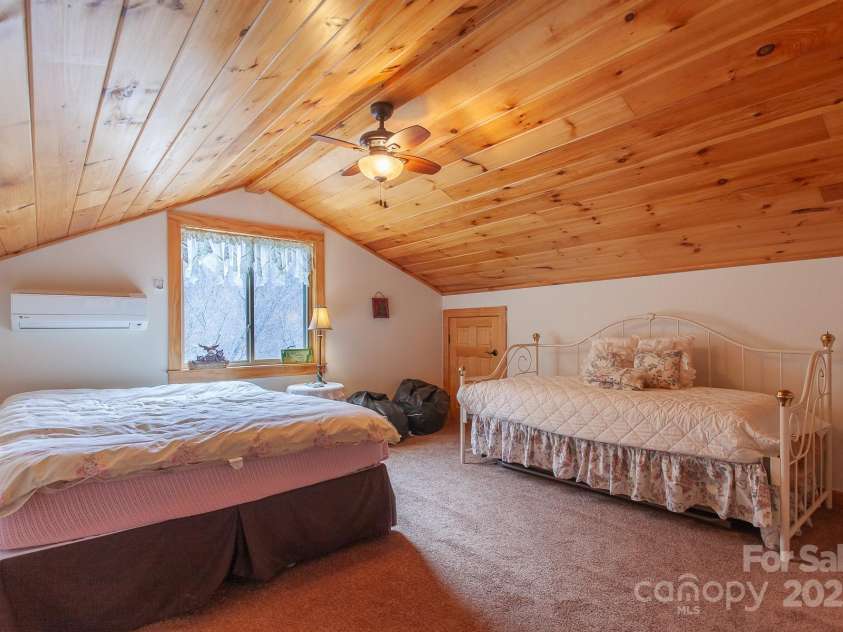 240 Hazelnut Road, Bryson City, NC 28713.  MLS# CAR4237311, YatesRealty ID 5006. 496 SF Loft is not included in the heated square footage do to ceiling height requirements.