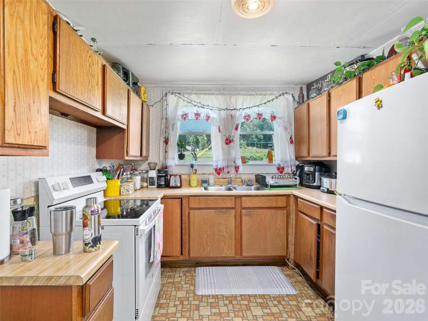 1125 & 1127 Glenn Bridge Road, Arden, NC 28704.  MLS# CAR4423618, YatesRealty ID 50068. 