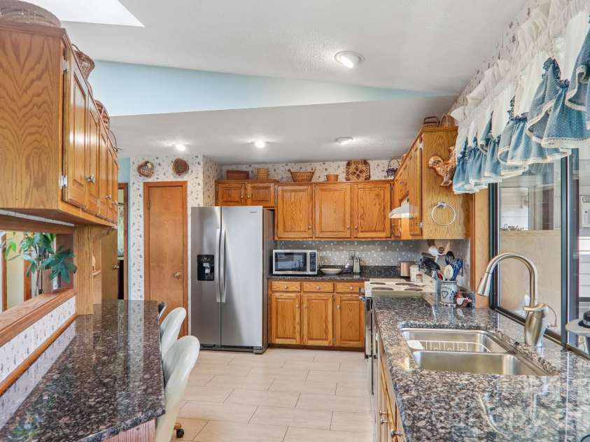 212 Rocky Meadow Lane, Etowah, NC 28729.  MLS# CAR4422905, YatesRealty ID 50071. 