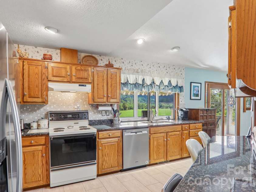 212 Rocky Meadow Lane, Etowah, NC 28729.  MLS# CAR4422905, YatesRealty ID 50071. 