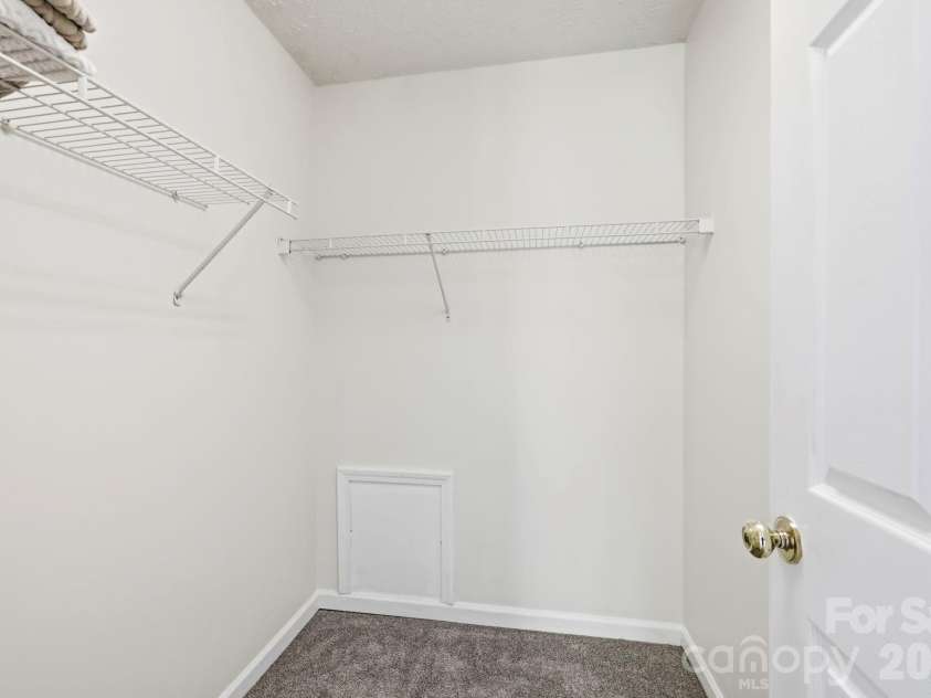 8A Bent Grass Court, Black Mountain, NC 28711.  MLS# CAR4422904, YatesRealty ID 50072. Primary BR Walk in Closet