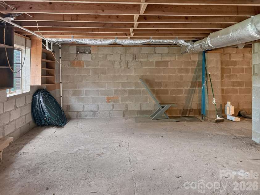 683 McDaniel Road, Lake Lure, NC 28746.  MLS# CAR4422885, YatesRealty ID 50074. Basement