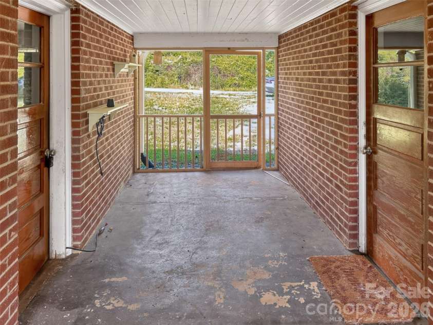 683 McDaniel Road, Lake Lure, NC 28746.  MLS# CAR4422885, YatesRealty ID 50074. Breezeway