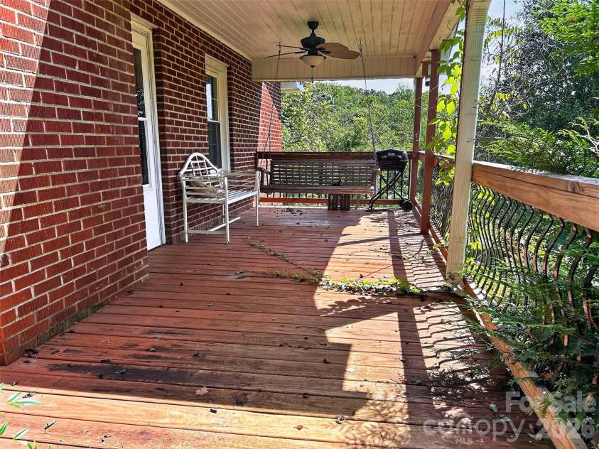 683 McDaniel Road, Lake Lure, NC 28746.  MLS# CAR4422885, YatesRealty ID 50074. Covered Side Deck
