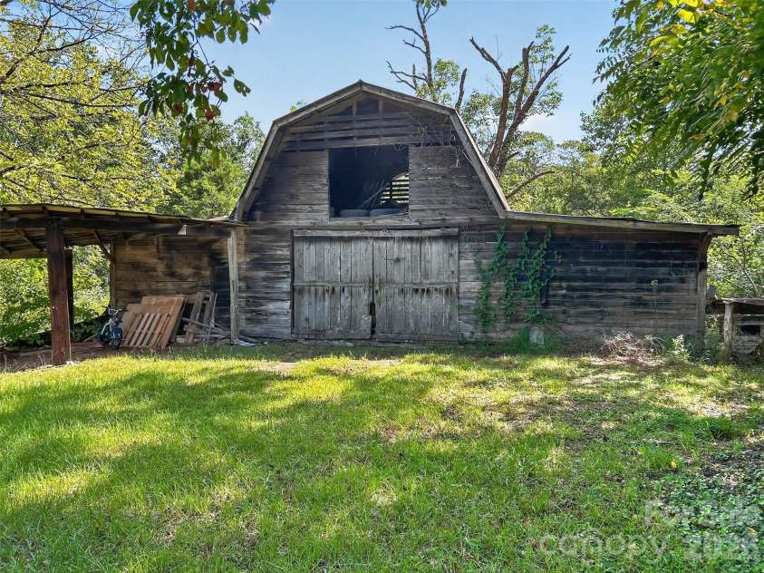 683 McDaniel Road, Lake Lure, NC 28746.  MLS# CAR4422885, YatesRealty ID 50074. Large barn