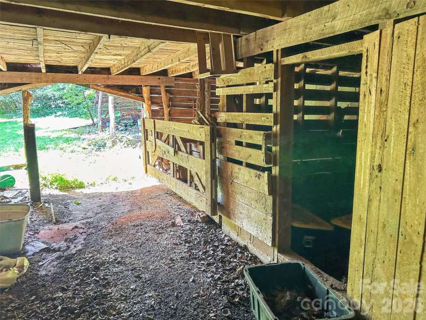 683 McDaniel Road, Lake Lure, NC 28746.  MLS# CAR4422885, YatesRealty ID 50074. Lg Barn Lower Level