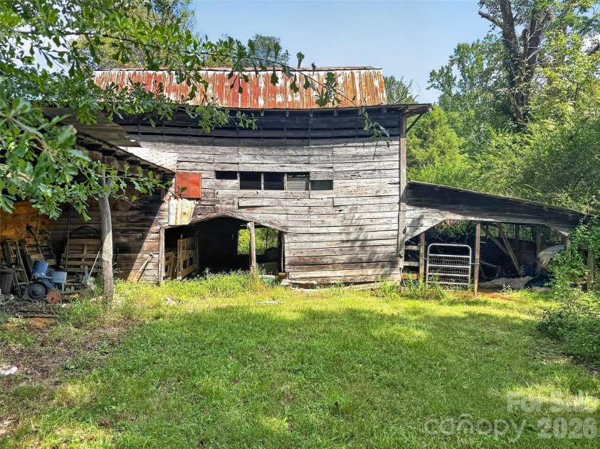 683 McDaniel Road, Lake Lure, NC 28746.  MLS# CAR4422885, YatesRealty ID 50074. Lg Barn Side View