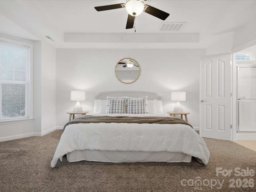 2000 Envoy Lane, Indian Trail, NC 28079.  MLS# CAR4420926, YatesRealty ID 50089. Primary suite on the main floor.