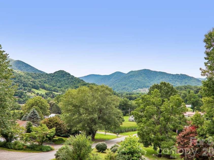 169 Highview Drive, Maggie Valley, NC 28751.  MLS# CAR4411083, YatesRealty ID 50102. Beautiful mountain views from the deck!