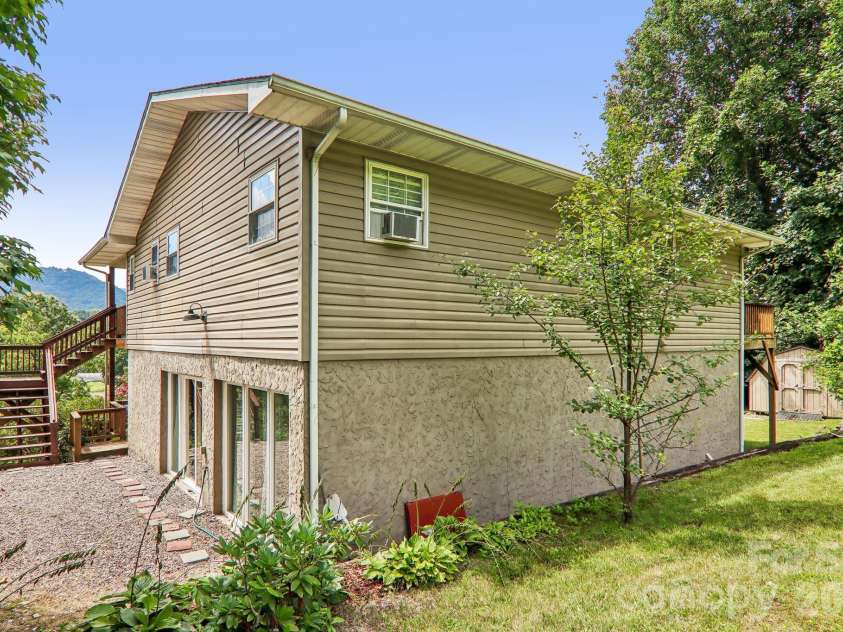 169 Highview Drive, Maggie Valley, NC 28751.  MLS# CAR4411083, YatesRealty ID 50102. Driveway and side view of home