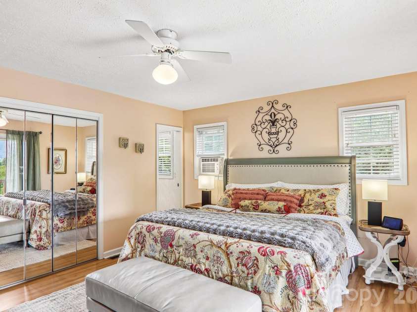 169 Highview Drive, Maggie Valley, NC 28751.  MLS# CAR4411083, YatesRealty ID 50102. Primary bedroom with mirrored closet