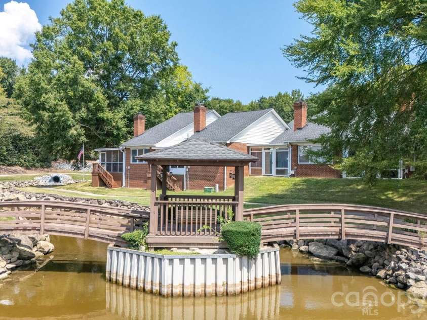 19942 Oak Leaf Circle, Cornelius, NC 28031.  MLS# CAR4423543, YatesRealty ID 50103. Neighborhood pond