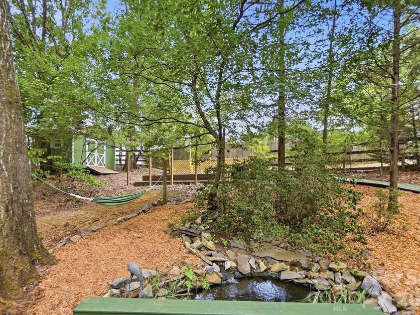 872 Old Bell Road, Charlotte, NC 28270.  MLS# CAR4417666, YatesRealty ID 50105. Backyard Pond